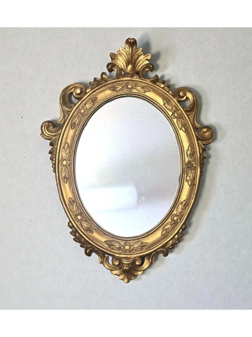 Ornate Gold Oval Mirror With Floral Details & Vintage Frame Design